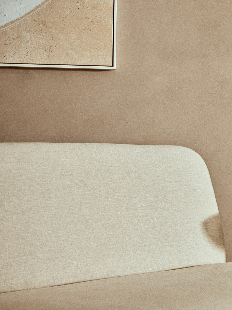 2 Seater Armless Cream Textured Linen Sofa with Wood Base | Parova